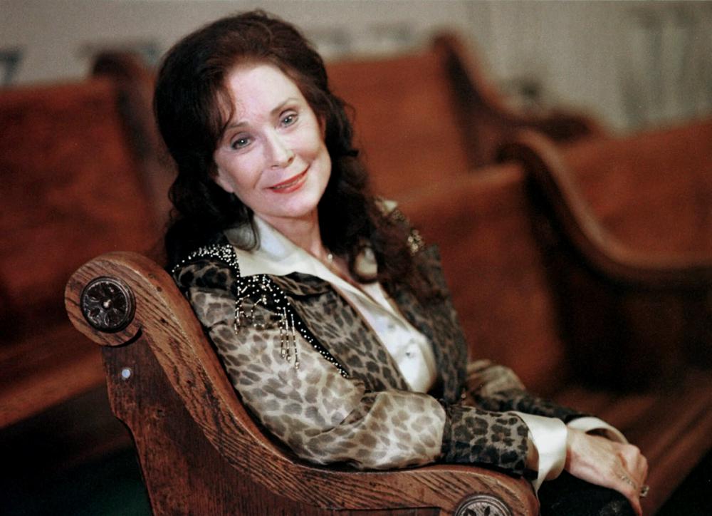 FILE - Country music great Loretta Lynn poses for a portrait in September 2000 in Nashville, Tenn. Lynn, the Kentucky coal miner’s daughter who became a pillar of country music, died Tuesday at her home in Hurricane Mills, Tenn. She was 90. (AP Photo/Christoper Berkey, File)
